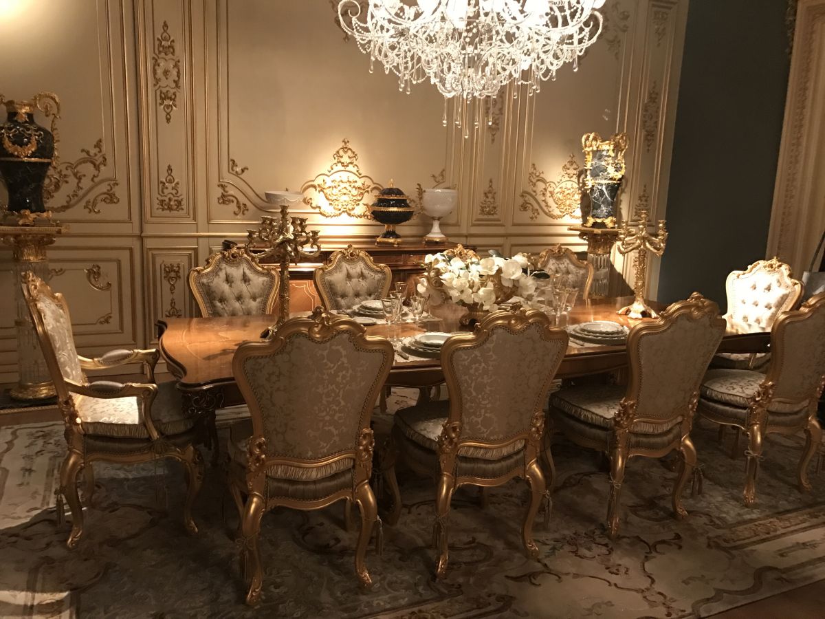 An abundance of gilded detailing is characteristic of a Baroque dining room.