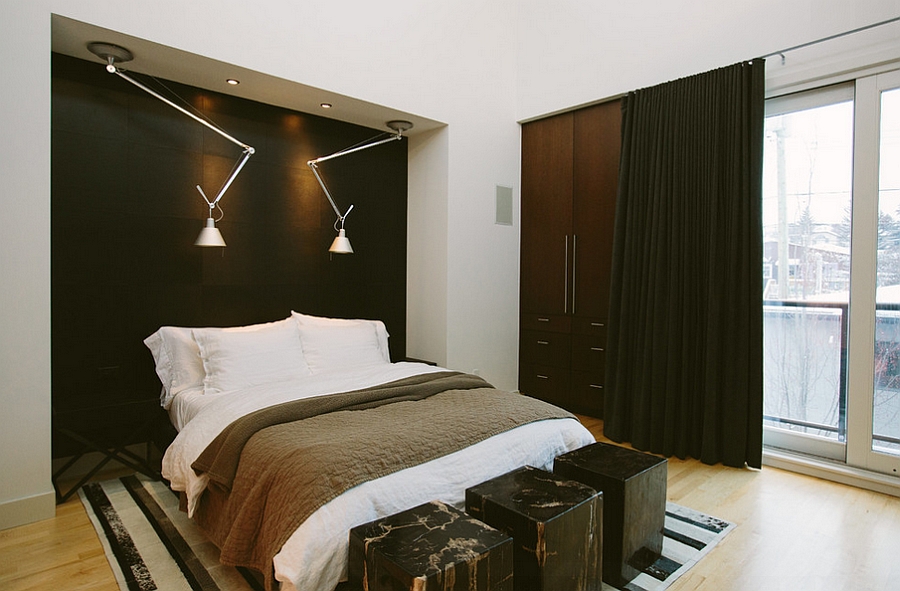 Дизайн чёрной стены у изголовья кровати в интерьере спальни